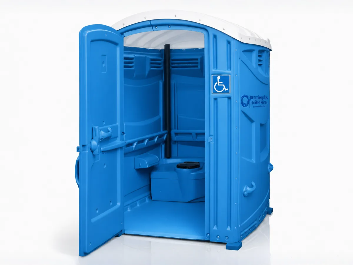 Accessible portable toilet interior with grab rails and wheelchair turning space