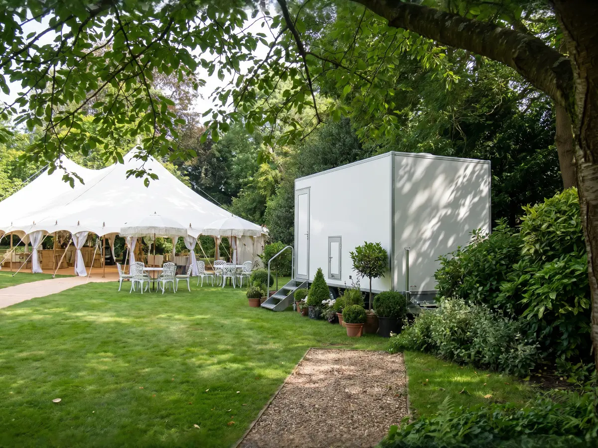 PremierPlus luxury toilet trailer set up at an outdoor event venue