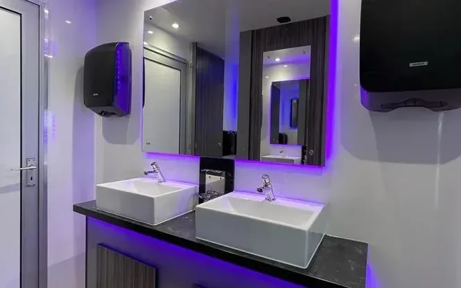 Luxury trailer toilet interior with mood lighting